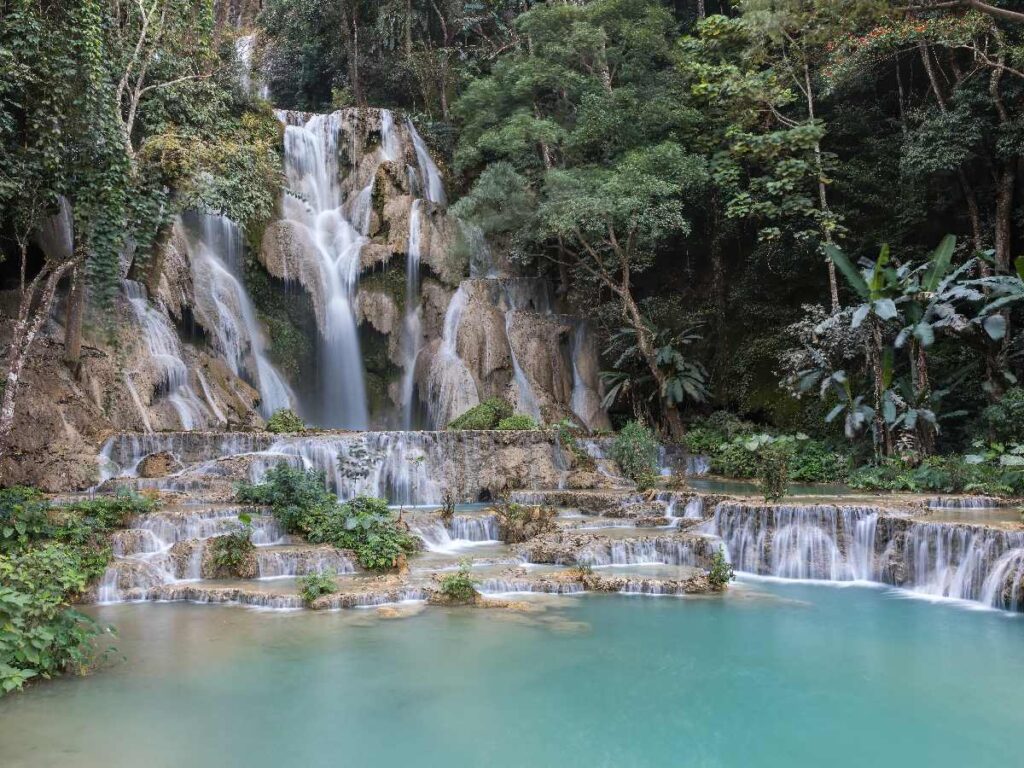 Kuang Si Falls and a turquoise water pool in Luang Prabang province Laos