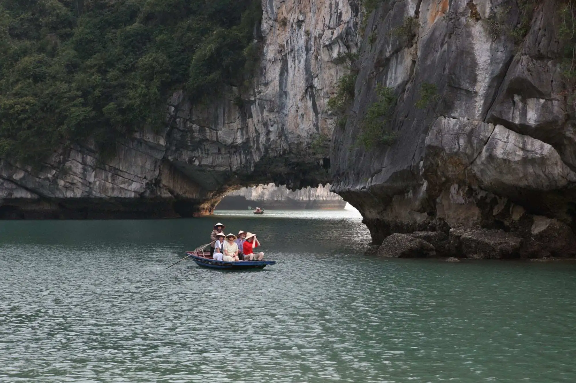 Halong Bay Tours Visit fishing village by row boat high