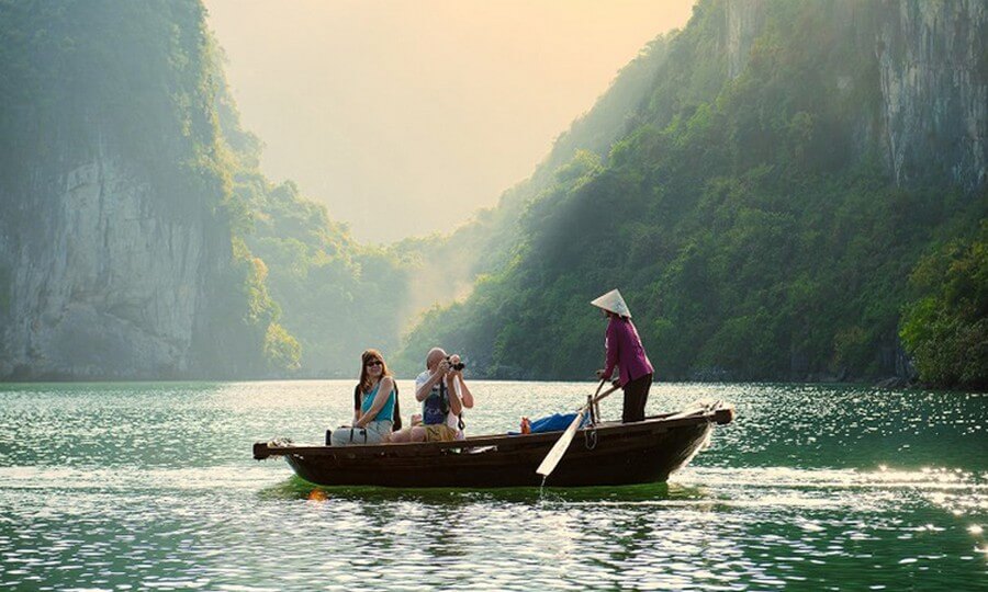 go bamboo boat in Luon Cave