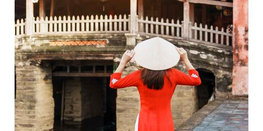 Get a custom made Ao Dai Vietnams iconic traditional dress Unique things to do in Vietnam