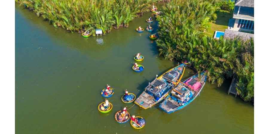 Glide through lush coconut forests in a traditional basket boat 11zon Unique things to do in Vietnam