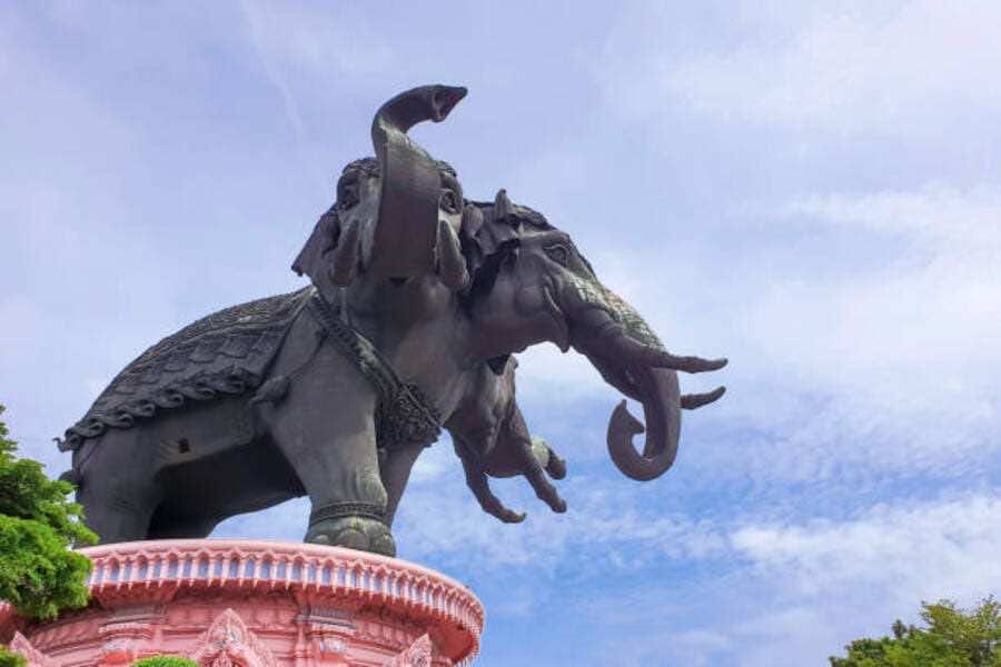 istockphoto 1169171219 612x612 1 At the Erawan Museum, families explore Thai myths, art, and gardens beneath a giant three-headed elephant.